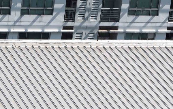 Dirty old metal texture roof of building and top view.